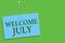 Text sign showing Welcome July. Conceptual photo Calendar Seventh Month 31days Third Quarter New Season Blue board wall message co