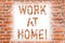 Text sign showing Work At Home. Conceptual photo Freelance job working on your house convenient technology Brick Wall