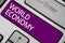 Text sign showing World Economy. Conceptual photo Global Worldwide International markets trade money exchange Keyboard purple key