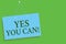 Text sign showing Yes You Can. Conceptual photo Positivity Encouragement Persuade Dare Confidence Uphold Blue board wall