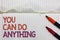 Text sign showing You Can Do Anything. Conceptual photo Motivation for doing something Believe in yourself White torn page written