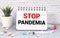 text STOP PANDEMIA on white paper, medical concept