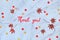 Text Thank you cut out of paper. Abstract Autumn seasonal background with natural maple leaves and red, orange, yellow circle