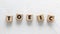 Text TOEIC on wooden cubes on white textured background. Abbreviation of `Test of English for International Communication