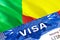 text VISA on Benin visa stamp in passport. passport traveling abroad concept. Travel to Benin concept - selective focus,3D