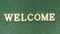 Text welcome on green backgrounds texture