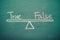 Text word true and false balance on seesaw drawing writing on chalkboard or blackboard background. Concept of true and false