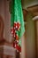 Textile decorations hanging inside Indian temple macro