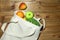 Textile grocery bag with fruits and vegetables on wooden table. Zero waste concept. Package-free food shopping