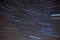 Textile pattern of startrails in Southern night