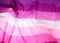 textile pink flag of lesbians, concept of the fight for equal rights and against sexual discrimination