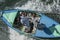 Textile salesmen in a boat on the River Nile at Luxor in Egypt.