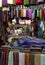 A textile weaver at work in the Fez medina, Morocco.