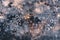 Texture abstract closeup background ice with grooves, furrows, and bubbles of air cought by frost in the mass of water