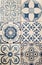 Texture - Array of Mediterranean style square tiles in white and blue