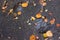 Texture of autumn leaves puddle of black asphalt