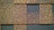 Texture background from asphalt roof and wall shingle. Imitation of pattern of gray and brown bricks. Gradient effect. Rectangle s