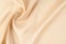 Texture background of fabric. Beige fabric. Silk fabric wallpaper texture background pattern in sepia pastel yellow cream beige t