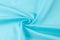 Texture background of fabric. Silk blue fabric, aqua, blue, Bond