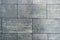 Texture background gray blue paving street tile.