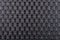 texture background holes on black metal with mesh