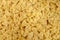Texture background made of farfalle, bow tie pasta