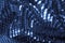 texture, background, pattern. Fabric with big sparkles of blue c