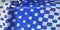 Texture background pattern. silk fabric with a pattern of blue squares on a white background. This is a heavy square 100%