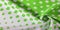 Texture background pattern. Silk fabric with a pattern of green squares on a white background. This is a heavy square 100%