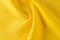 Texture, background, pattern. Yellow jacquard fabric. Providing