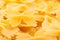 Texture background of raw italian pasta farfalle made of wheat f