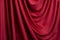 Texture, background, template. Silk fabric. Red silk drapery and upholstery fabric. Solid fabrics for backdrop, drapes, flags