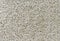 Texture of the beige carpet with soft pile. Carpet background