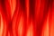 Texture of blonde combed hair illuminated by red light. Strands of light woman hair. Curl of healthy natural female hair