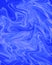 The texture of blue liquid marble. Blue shiny background with natural texture