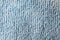 Texture of blue microfiber fabric close up