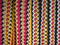 Texture braided rope white, yellow, and red colors. Background.