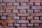 The texture of the brickwork.