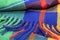 Texture of a bright multicolor scarf with fringe