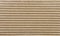 Texture of brown ribbed cardboard, striped carton