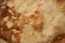 Texture of a cooked thin pancake closeup.