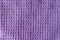 The texture of a crumpled colorful lilac violet color fabric texture background