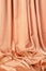 Texture of delicate peach silk as background