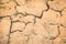 Texture of dry cracked earth global warming and greenhouse effect. Brown dry soil erosion.