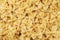 Texture of dry Italian pasta macaroni bows farfalle. Close up. Background carbohydrates food