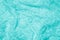 Texture, fabric, background. Lacy turquoise fabric, lace. A thin