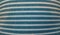 Texture of a fabric of a pillow, sofa, bed, background. Close up, striped, blue and white horizontal lines.