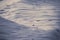 The texture of the February snow and snowdrifts close-up