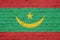 Texture of a flag of Mauritania on a wall.