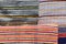 Texture of four various carpets handmade on hand-loom with colorful vertical lines